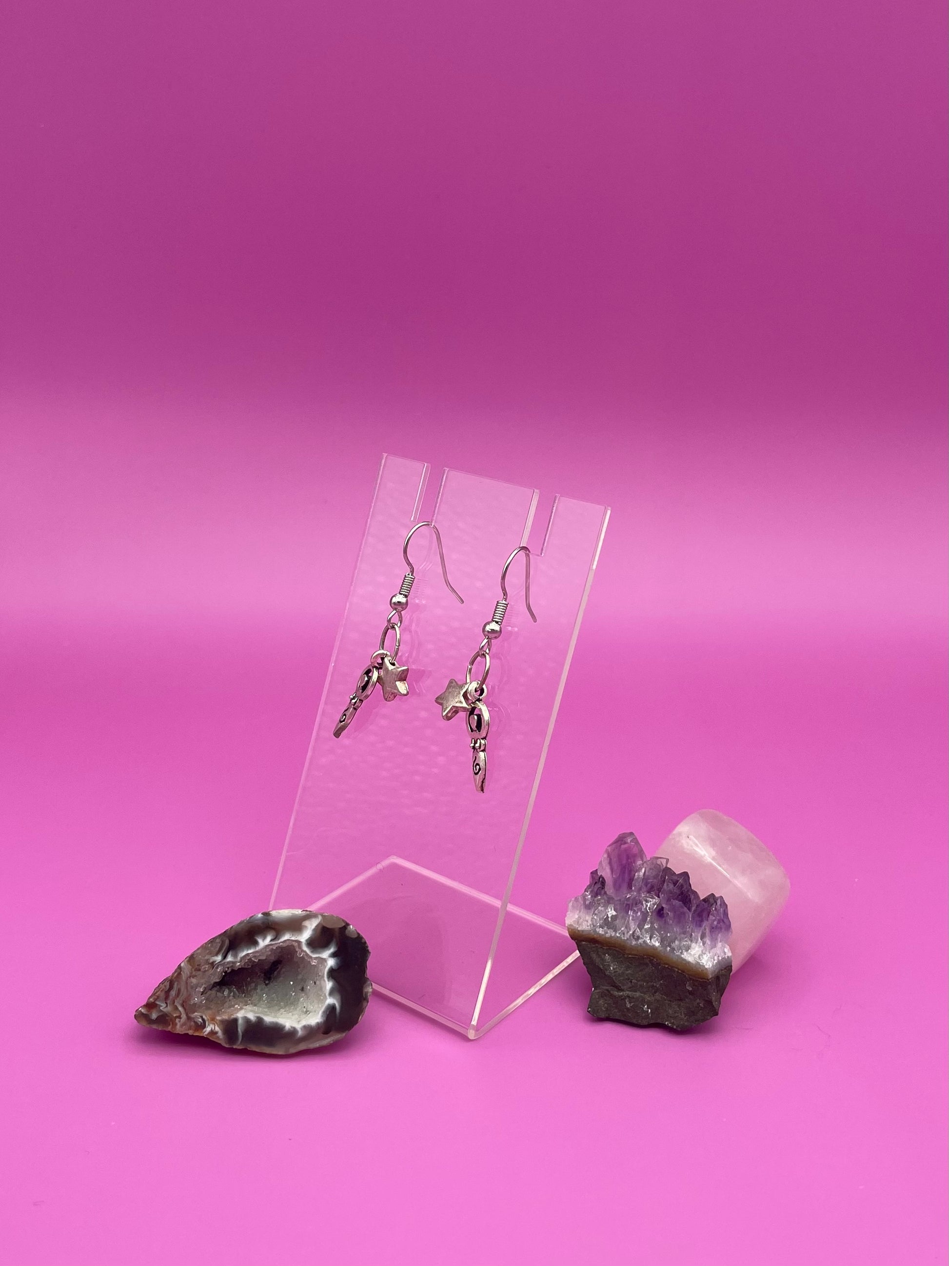 Mother of life with star earrings on clear stand 